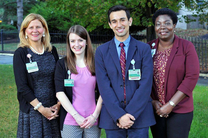 From left to right: Christine M. Berard-Collins, Laura M. (Hunt) McAuliffe, Andrew R. Zullo, Ruth Dapaah-Afriyie