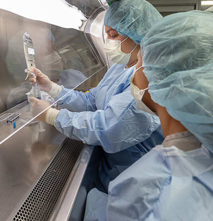 two pharmacists compounding