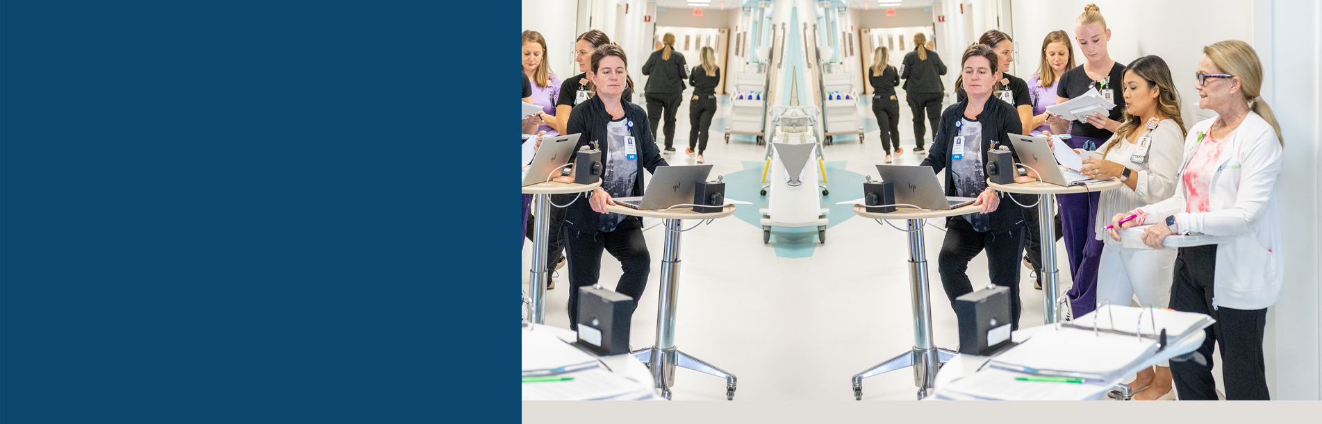header image of hospital staff meeting in a hallway