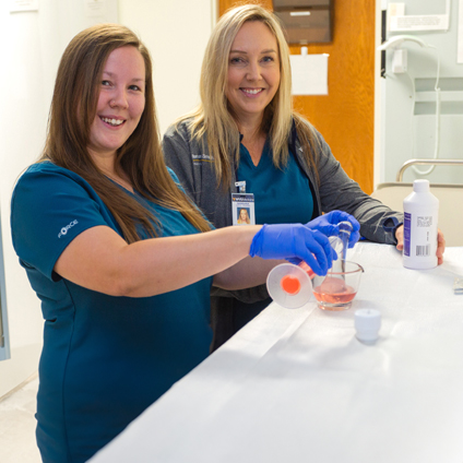 two female technicians in a lab